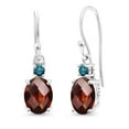 thumbnail image 1 of Gem Stone King 10K White Gold Red Garnet and Blue Diamond Dangle Earrings for Women (2.93 Cttw, Gemstone Birthstone, Oval 8x6mm), 1 of 5