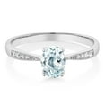 thumbnail image 1 of Gem Stone King 10K White Gold Sky Blue Aquamarine and White Diamond Engagement Ring for Women (0.78 Cttw, Gemstone March Birthstone, Oval 7X5MM, Available in Size 5, 6, 7, 8, 9), 1 of 5