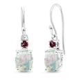 thumbnail image 1 of Gem Stone King 10K White Gold White Opal and Red Rhodolite Garnet Dangle Earrings for Women (2.28 Cttw, Gemstone Birthstone, Oval 8x6mm), 1 of 5