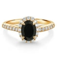 thumbnail image 1 of Gem Stone King 10K Yellow Gold Black Onyx and White Lab Grown Diamond Halo Engagement Ring for Women (1.01 Cttw, Gemstone December Birthstone, Oval 7X5MM), 1 of 4