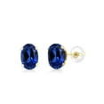 thumbnail image 1 of Gem Stone King 10K Yellow Gold Blue Created Sapphire Stud Earrings for Women Men (1.20 Cttw, Gemstone September Birthstone, Oval 6X4MM), 1 of 3