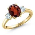 thumbnail image 1 of Gem Stone King 10K Yellow Gold Red Garnet and Sky Blue Aquamarine Engagement Ring for Women | 2.63 Cttw | Oval 9X7MM | Gemstone January Birthstone | Size 6, 1 of 6