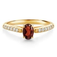thumbnail image 1 of Gem Stone King 10K Yellow Gold Red Garnet and White Lab Grown Diamond Engagement Ring for Women (0.75 Cttw, Oval 6X4MM, Gemstone January Birthstone, Size 5), 1 of 4