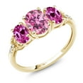 thumbnail image 1 of Gem Stone King 10K Yellow Gold 3-Stone Ring Oval Pink Moissanite and Created Sapphire Pink (1.92 Cttw, Size 6), 1 of 4