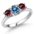 thumbnail image 1 of Gem Stone King 14K White Gold Persian Blue Moissanite & Red Rhodolite Garnet 3-Stone Engagement Ring | 1.24 Cttw | Round 5MM and 4MM | Three Stone Wedding Anniversary Promise Ring for Women (Size 7), 1 of 6