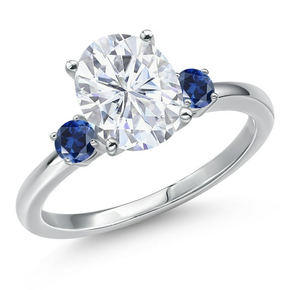 Gem Stone King 14K White Gold White Moissanite and Blue Created Sapphire 3-Stone Engagement Ring for Women | 3.28 Cttw | Oval 10X8MM and Round 3MM (Size 7)