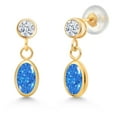 thumbnail image 1 of Gem Stone King 14K Yellow Gold Fancy Blue Zirconia and White Zirconia Drop Dangle Earrings for Women (1.08 Cttw, Gemstone Birthstone, Oval 6X4MM, Round 3MM), 1 of 4