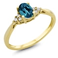 thumbnail image 1 of Gem Stone King 14K Yellow Gold London Blue Topaz and Diamond Engagement Ring for Women (0.50 Cttw, Oval 6X4MM, Available in Size 5, 6, 7, 8, 9), 1 of 5