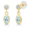 thumbnail image 1 of Gem Stone King 14K Yellow Gold Sky Blue Topaz and White Moissanite Drop Dangle Earrings for Women (1.20 Cttw, Gemstone Birthstone, Oval 6X4MM, Round 3MM), 1 of 4