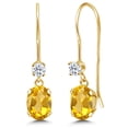 thumbnail image 1 of Gem Stone King 14K Yellow Gold Yellow Citrine and White Topaz French Wire Dangle Earrings for Women (0.96 Cttw, Gemstone November Birthstone, Oval 6X4MM and Round 2.5MM), 1 of 6
