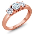 thumbnail image 1 of Gem Stone King 18K Rose Gold Plated Silver 3-Stone Ring Round Sky Blue Aquamarine and Moissanite (0.96 Cttw, Size 6), 1 of 5