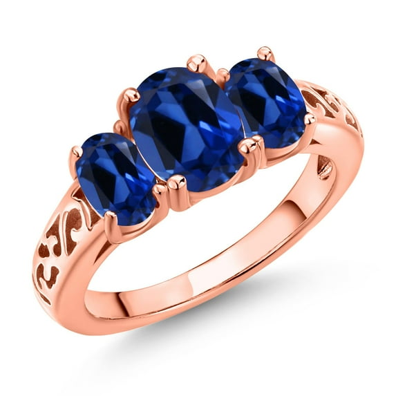 Gem Stone King 18K Rose Gold Plated Silver Blue Created Sapphire Filigree Style 3 Stone Ring for Women (2.80 Cttw, Oval 8X6MM and 6X4MM) (Size 5)