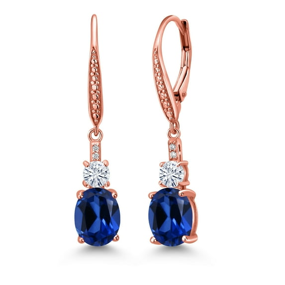 Gem Stone King 18K Rose Gold Plated Silver Blue Created Sapphire and Moissanite Dangle Earrings for Women with Lab Grown Diamond (5.09 Cttw, Oval 9X7MM)