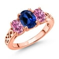 thumbnail image 1 of Gem Stone King 18K Rose Gold Plated Silver Blue Created Sapphire and Pink Moissanite Filigree Style 3 Stone Ring for Women (2.52 Cttw, Oval 8X6MM and 6X4MM, Available in Size 5, 6, 7, 8, 9), 1 of 6
