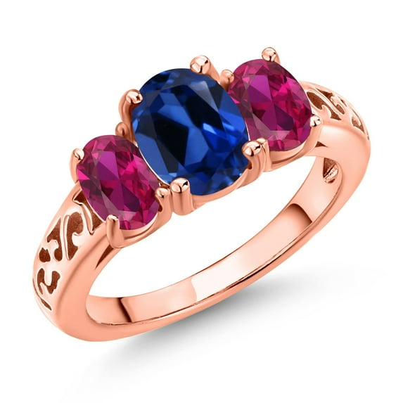 Gem Stone King 18K Rose Gold Plated Silver Blue Created Sapphire and Red Created Ruby Filigree Style 3 Stone Ring for Women (2.60 Cttw, Oval 8X6MM and 6X4MM) (Size 9)