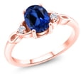 thumbnail image 1 of Gem Stone King 18K Rose Gold Plated Silver Blue Created Sapphire and White Moissanite 3-Stone Rings for Women (1.68 Cttw, Gemstone September Birthstone, Oval 8X6MM, Available in Size 5, 6, 7, 8, 9), 1 of 5