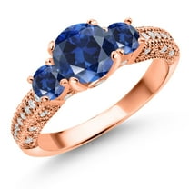 Gem Stone King 18K Rose Gold Plated Silver Blue Created Sapphire and White Moissanite Engagement Ring for Women (2.18 Cttw, Gemstone September Birthstone, Round 7MM and 4MM, Size 6)