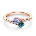 thumbnail image 1 of Gem Stone King 18K Rose Gold Plated Silver Blue Tanzanite and London Blue Topaz Bypass Ring for Women (0.87 Cttw, Gemstone December Birthstone, Round 4MM, Size 9), 1 of 4
