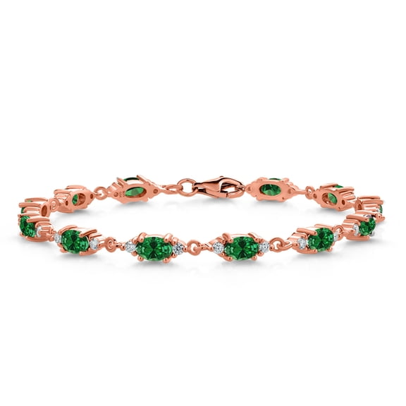 Gem Stone King 18K Rose Gold Plated Silver Green Created Emerald and White Moissanite Tennis Bracelet for Women (5.11 Cttw, Gemstone Birthstone, Oval 6X4MM, 7.5 inch)