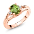 thumbnail image 1 of Gem Stone King 18K Rose Gold Plated Silver Green Peridot and White Lab Grown Diamond 3 Stone Engagement Ring for Women | 1.50 Cttw | Oval 8X6MM | Round 2MM | Gemstone August Birthstone | Size 6, 1 of 6