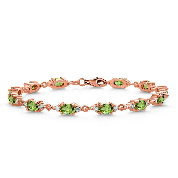 Gem Stone King 18K Rose Gold Plated Silver Green Peridot and White Moissanite Tennis Bracelet for Women (6.91 Cttw, Gemstone Birthstone, Oval 6X4MM, 6.5 inch)
