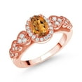 thumbnail image 1 of Gem Stone King 18K Rose Gold Plated Silver Orange Red Madeira Citrine and White Moissanite Engagement Ring for Women | 0.88 Cttw | Oval 7X5MM | Gemstone November Birthstone | Size 9, 1 of 3