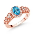 thumbnail image 1 of Gem Stone King 18K Rose Gold Plated Silver American Blue Mystic Topaz and White Moissanite Engagement Ring for Women | 1.18 Cttw | Oval 7X5MM | Gemstone November Birthstone | Size 6, 1 of 3