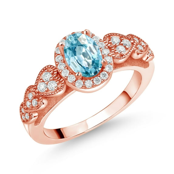 Gem Stone King 18K Rose Gold Plated Silver Blue Zircon and White Moissanite Engagement Ring for Women | 1.43 Cttw | Oval 7X5MM | Gemstone Birthstone | Size 5
