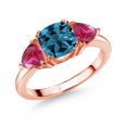 thumbnail image 1 of Gem Stone King 18K Rose Gold Plated Silver London Blue Topaz and Red Created Ruby 3 Stone Engagement Ring for Women (2.71 Cttw, Gemstone November Birthstone, Available in Size 5, 6, 7, 8, 9), 1 of 3