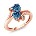 thumbnail image 1 of Gem Stone King 18K Rose Gold Plated Silver Persian Blue Moissanite and White Lab Grown Diamond Ring for Women (1.63 Cttw, Heart Shape 6MM, Gemstone Birthstone, Available in Size 5, 6, 7, 8, 9), 1 of 6