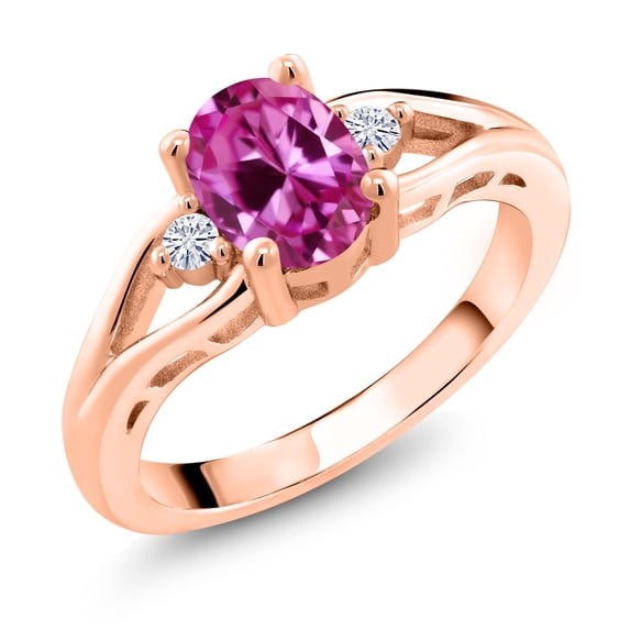 Gem Stone King 18K Rose Gold Plated Silver Pink Created Sapphire and White Moissanite 3 Stone Engagement Ring for Women | 1.73 Cttw | Oval 8X6MM | Round 2MM | Gemstone September Birthstone | Size 5
