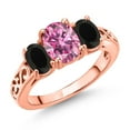 thumbnail image 1 of Gem Stone King 18K Rose Gold Plated Silver Pink Moissanite and Black Onyx Filigree Style 3 Stone Ring for Women (2.18 Cttw, Oval 8X6MM and 6X4MM, Available in Size 5, 6, 7, 8, 9), 1 of 6