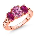 thumbnail image 1 of Gem Stone King 18K Rose Gold Plated Silver Pink Moissanite and Red Created Ruby Filigree Style 3 Stone Ring for Women (2.38 Cttw, Oval 8X6MM and 6X4MM, Available in Size 5, 6, 7, 8, 9), 1 of 6
