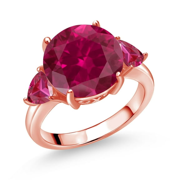 Gem Stone King 18K Rose Gold Plated Silver Red Created Ruby 3-Stone Ring for Women (7.86 Cttw, Round 12MM, Trillion 5MM, Size 6)