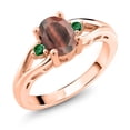 thumbnail image 1 of Gem Stone King 18K Rose Gold Plated Silver Red Tiger Eye and Green Nano Emerald 3 Stone Engagement Ring for Women | 1.30 Cttw | Oval 8X6MM | Round 2MM | Gemstone Birthstone | Size 5, 1 of 6