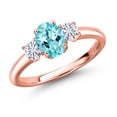 thumbnail image 1 of Gem Stone King 18K Rose Gold Plated Silver Blue Apatite and White Moissanite Engagement Ring for Women | 1.14 Cttw | Oval 7X5MM | Gemstone Birthstone | Size 5, 1 of 7