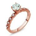 thumbnail image 1 of Gem Stone King 18K Rose Gold Plated Silver Ring Round Sky Blue Aquamarine and Moissanite (0.87 Cttw, Size 6), 1 of 2