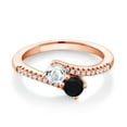 thumbnail image 1 of Gem Stone King 18K Rose Gold Plated Silver Sky Blue Aquamarine and Black Onyx Bypass Ring for Women (0.71 Cttw, Gemstone March Birthstone, Round 4MM, Size 7), 1 of 4
