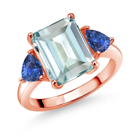 Gem Stone King 18K Rose Gold Plated Silver Sky Blue Simulated Aquamarine and Blue Created Sapphire 3 Stone Ring for Women (6.49 Cttw, Octagon 12X10MM, Trillion 5X5MM, March Birthstone, Size 5)