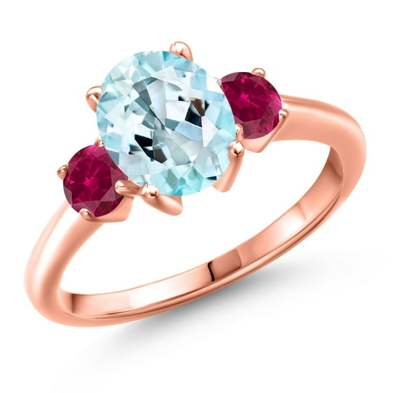 Gem Stone King 18K Rose Gold Plated Silver Sky Blue Topaz and Red Created Ruby Engagement Ring for Women | 2.50 Cttw | Oval 9X7MM | Gemstone November Birthstone | Size 7