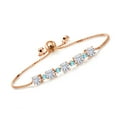 thumbnail image 1 of Gem Stone King 18K Rose Gold Plated Silver Swiss Blue Topaz Bracelet for Women Set with Moissanite (2.82 Cttw), 1 of 5
