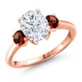 thumbnail image 1 of Gem Stone King 18K Rose Gold Plated Silver White Moissanite and Red Garnet Engagement Ring for Women | 2.84 Cttw | Oval 9X7MM | Gemstone Birthstone | Size 9, 1 of 7