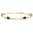 thumbnail image 1 of Gem Stone King 18K Yellow Gold Plated Silver Blue Created Sapphire and White Diamond Tennis Bracelet for Women | 4.26 Cttw | Gemstone September Birthstone | Oval 7X5MM | 6 inch + 1 inch Extender, 1 of 3