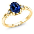 thumbnail image 1 of Gem Stone King 18K Yellow Gold Plated Silver Blue Created Sapphire and White Moissanite 3-Stone Rings for Women (1.68 Cttw, Gemstone September Birthstone, Oval 8X6MM, Available in Size 5, 6, 7, 8, 9), 1 of 5