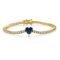 thumbnail image 1 of Gem Stone King 18K Yellow Gold Plated Silver Blue Created Sapphire and White Moissanite Tennis Bracelet for Women (3.93 Cttw, Gemstone Birthstone, Heart Shape 8MM, 7.25 inch), 1 of 6