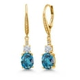 thumbnail image 1 of Gem Stone King 18K Yellow Gold Plated Silver London Blue Topaz and Moissanite Dangle Earrings for Women with Lab Grown Diamond (4.99 Cttw, Oval 9X7MM), 1 of 3