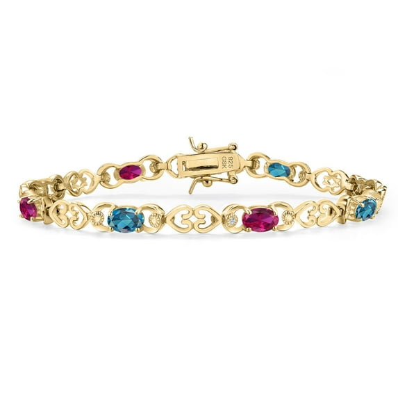 18K Yellow Gold Plated Silver London Blue Topaz and Red Created Ruby and Lab Grown Diamond Bracelet for Women | 4.41 Cttw | Gemstone November Birthstone | Oval 6X4MM | Length 7.25 inches