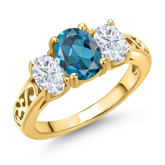 Gem Stone King 18K Yellow Gold Plated Silver London Blue Topaz and White Moissanite Filigree Style 3 Stone Ring for Women (2.50 Cttw, Oval 8X6MM and 6X4MM) (Size 5)