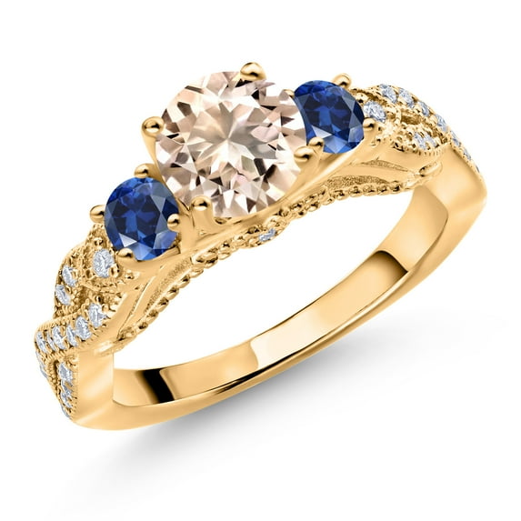 Gem Stone King 18K Yellow Gold Plated Silver Peach Morganite Blue Created Sapphire and White Moissanite Engagement Ring for Women (1.15 Cttw, Gemstone October Birthstone, Round 6MM and 3MM, Size 7)