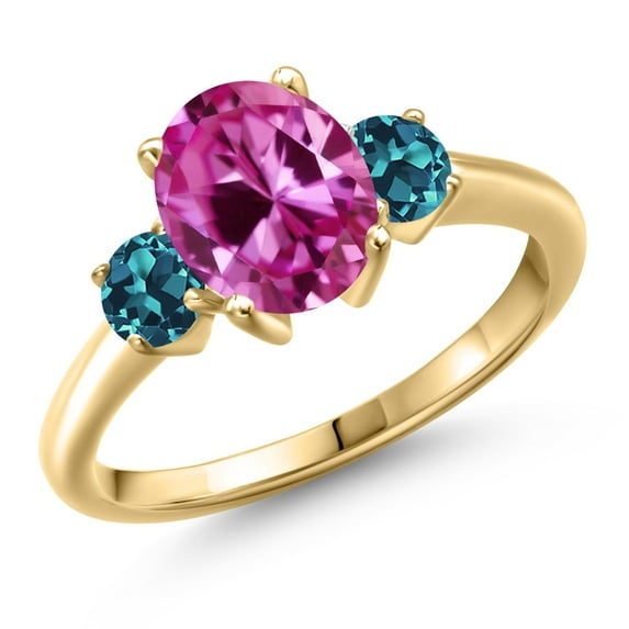 Gem Stone King 18K Yellow Gold Plated Silver Pink Created Sapphire and London Blue Topaz Engagement Ring for Women | 1.66 Cttw | Oval 9X7MM | Gemstone September Birthstone | Size 5